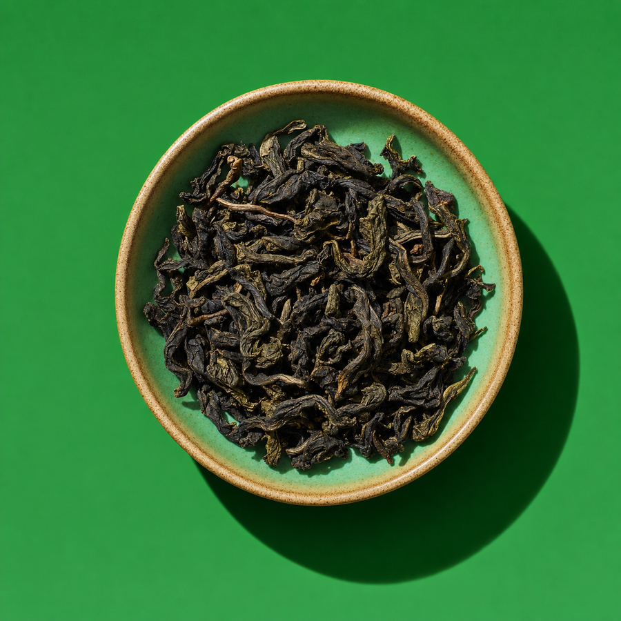 GABA Oolong tea on vivid green background — sticker energy product photography