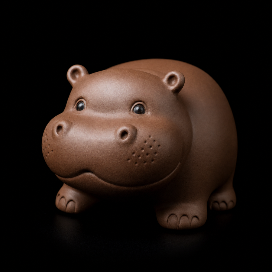 Clay Tea Pet Hippo on black background — sticker energy product photography